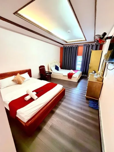 Chambre quadruple duplex — Crowne Boutique Hotel